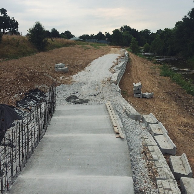 We're home from Colorado...and it feels so good to be back in Springdale! While we were gone, part of the Razorback Greenway trail behind Magnolia Gardens was paved! They're making great progress on the trails all over town. Have you noticed any progress near you?
